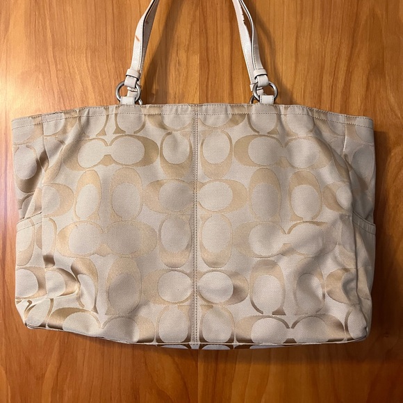 Larger Coach tote- has blemishes pictured on handles. Make up stain on the insid - Picture 2 of 5